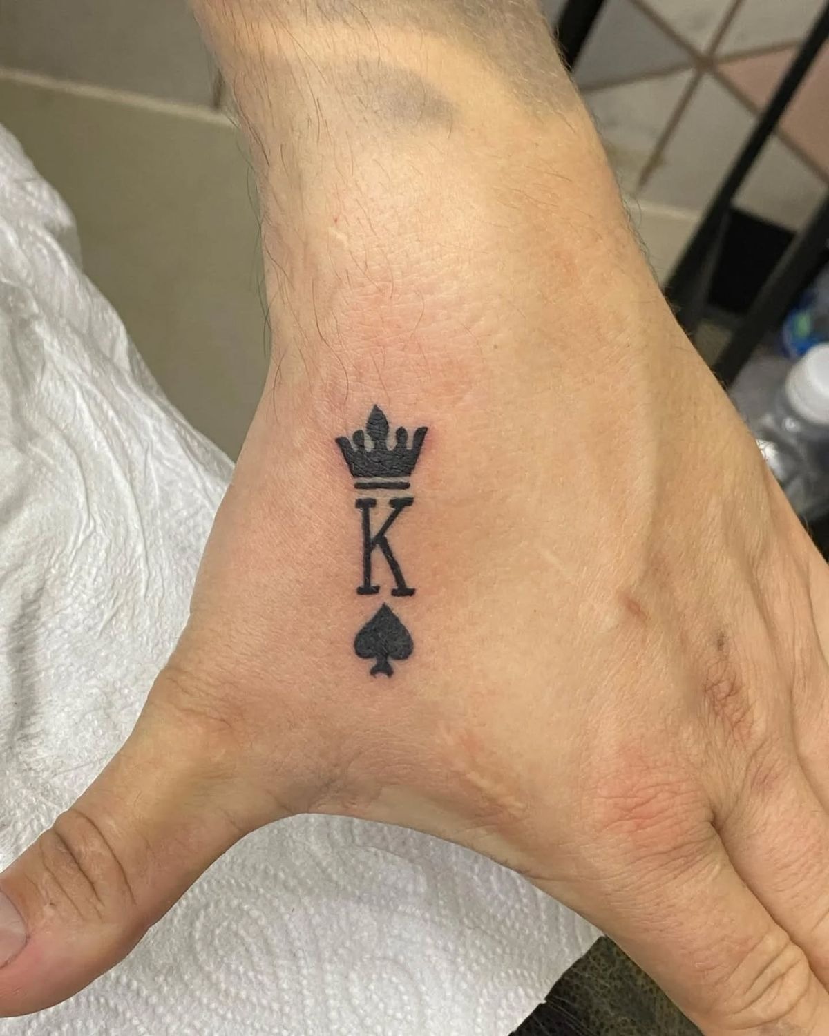 Royal Hand Crown Detail Tattoo Design