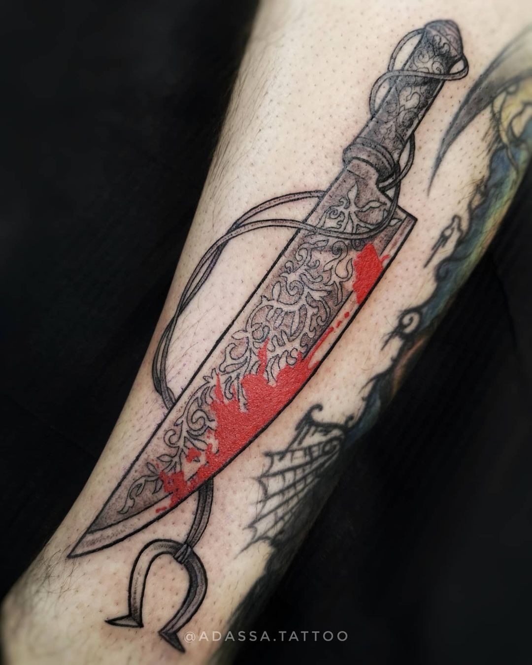 Bold Black and Red Knife Tattoo Tattoo Design