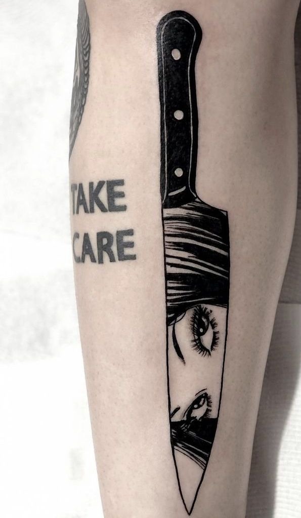 Knife with Face Reflection Tattoo Tattoo Design