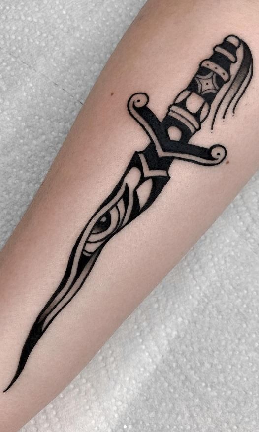Tribal-Inspired Knife Tattoo Tattoo Design