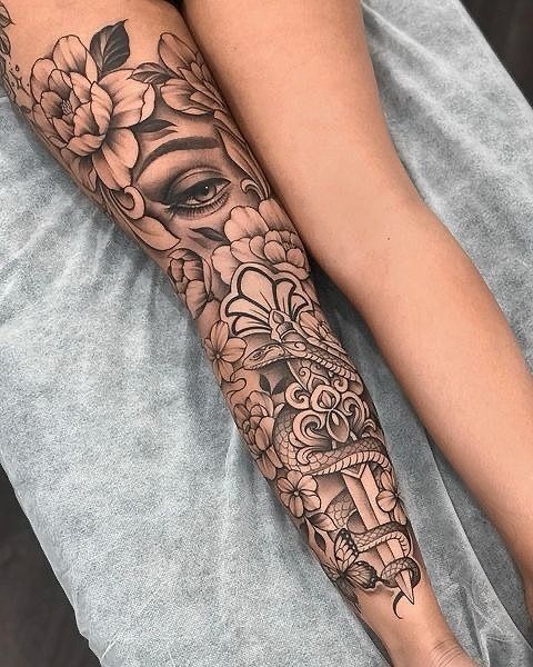All-Seeing Eye with Floral Flow Tattoo Design