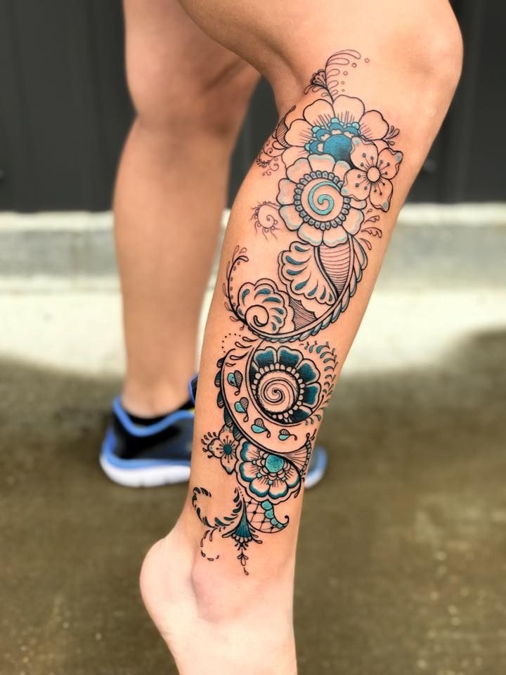 Whimsical Floral Swirls with Teal Pops Tattoo Design
