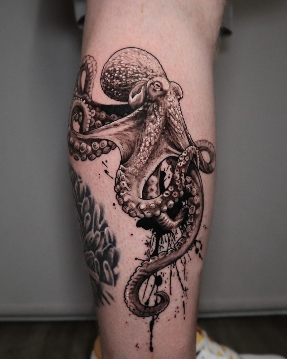 Realistic Octopus Tattoo with Ink Splash Effect Tattoo Design