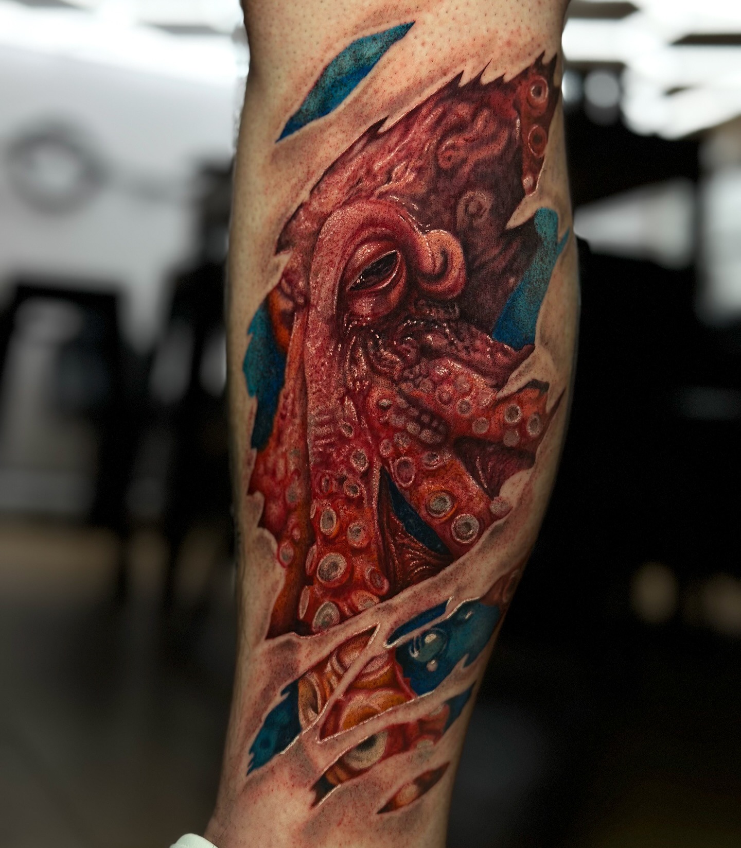 Ripped Skin Octopus Tattoo Tattoo Design