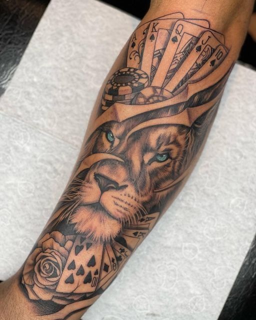Lion with Royal Card Crown Tattoo Design