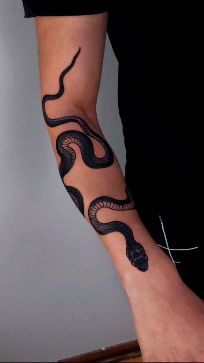 Minimal Flowing Black Snake Tattoo Design
