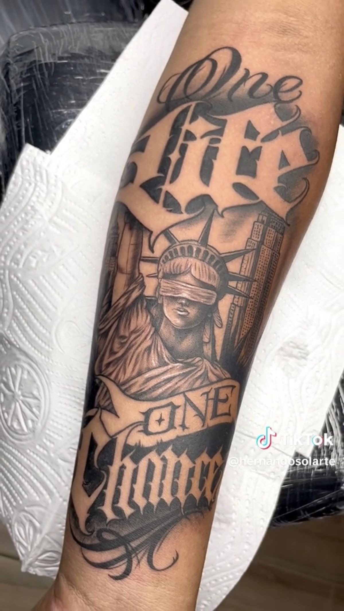 One Life Statue Typography Tattoo Design