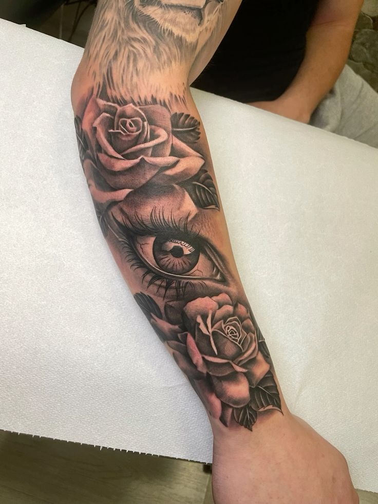 Realistic Eye and Rose Composition Tattoo Design