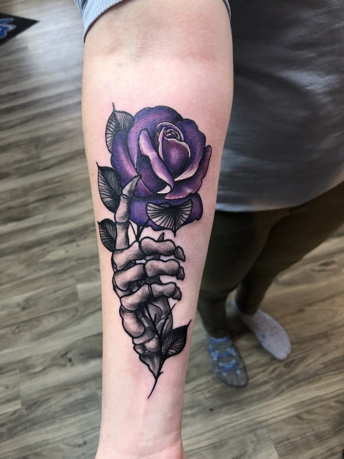 Skeleton Hand with Violet Rose Tattoo Design