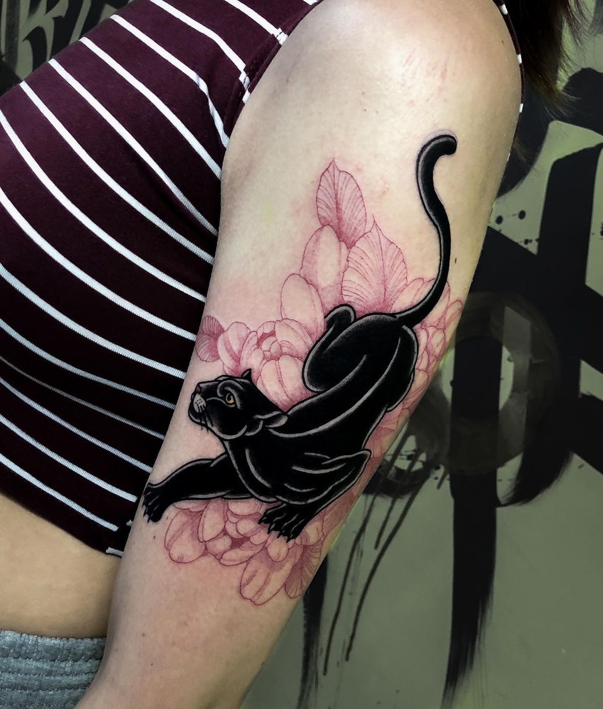Black Panther With Soft Pink Florals Tattoo Design