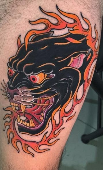 Flaming Panther Face Tattoo Design