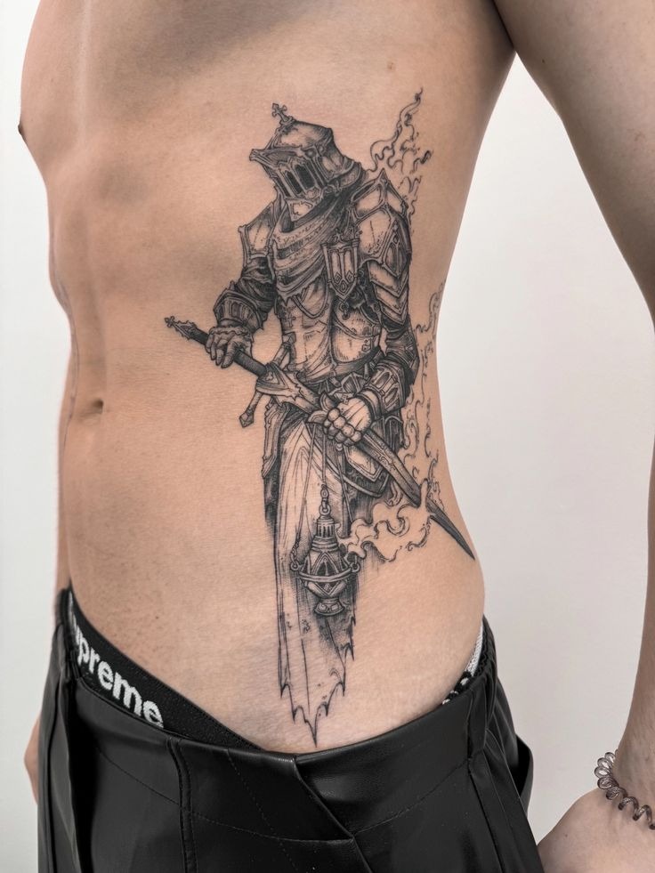 Medieval Knight Rib Tattoo with Dark Armor Tattoo Design