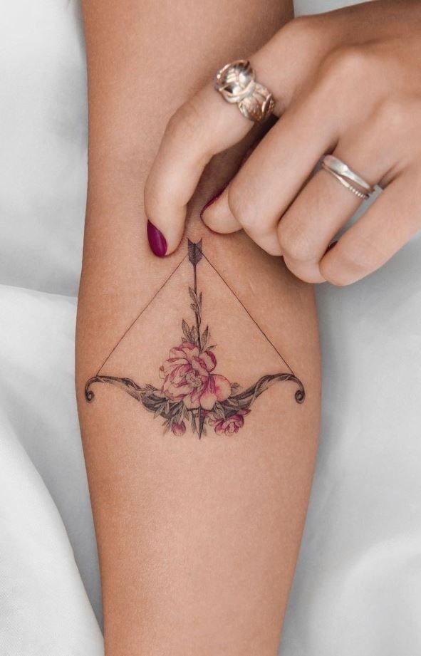 Floral Bow and Arrow Tattoo Design