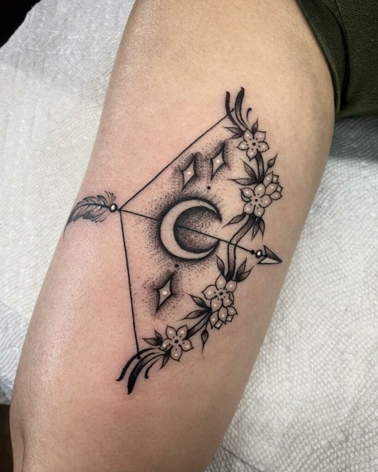 Floral Moon Bow Tattoo Design