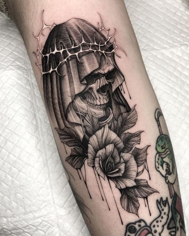 Blackwork Santa Muerte Forearm Tattoo With Flowers, a tattoo design rendered in clean detailed linework for the leg.