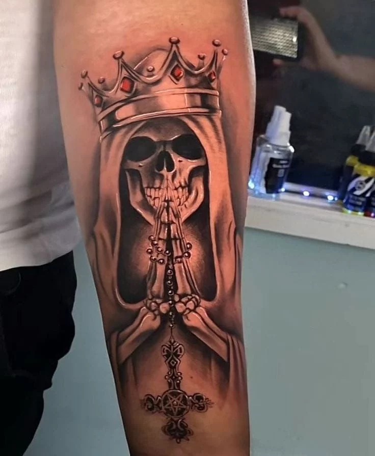 Crowned Santa Muerte Praying Tattoo, a tattoo design rendered in bold for the hand.