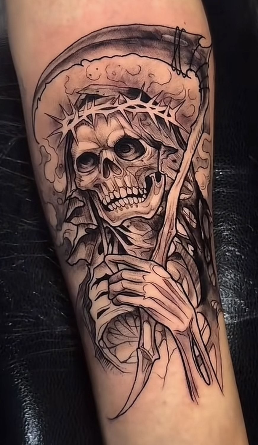 Crowned Santa Muerte With Scythe Tattoo, a tattoo design rendered in bold.