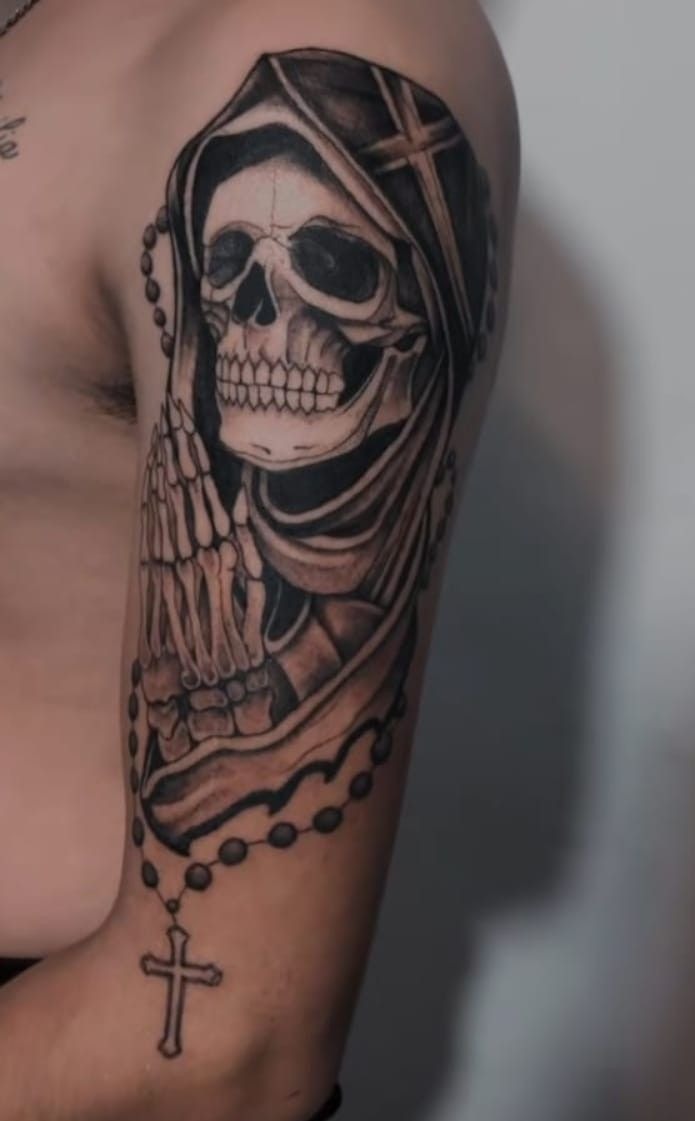 Praying Santa Muerte Shoulder Tattoo With Rosary, a tattoo design rendered in clean detailed linework.