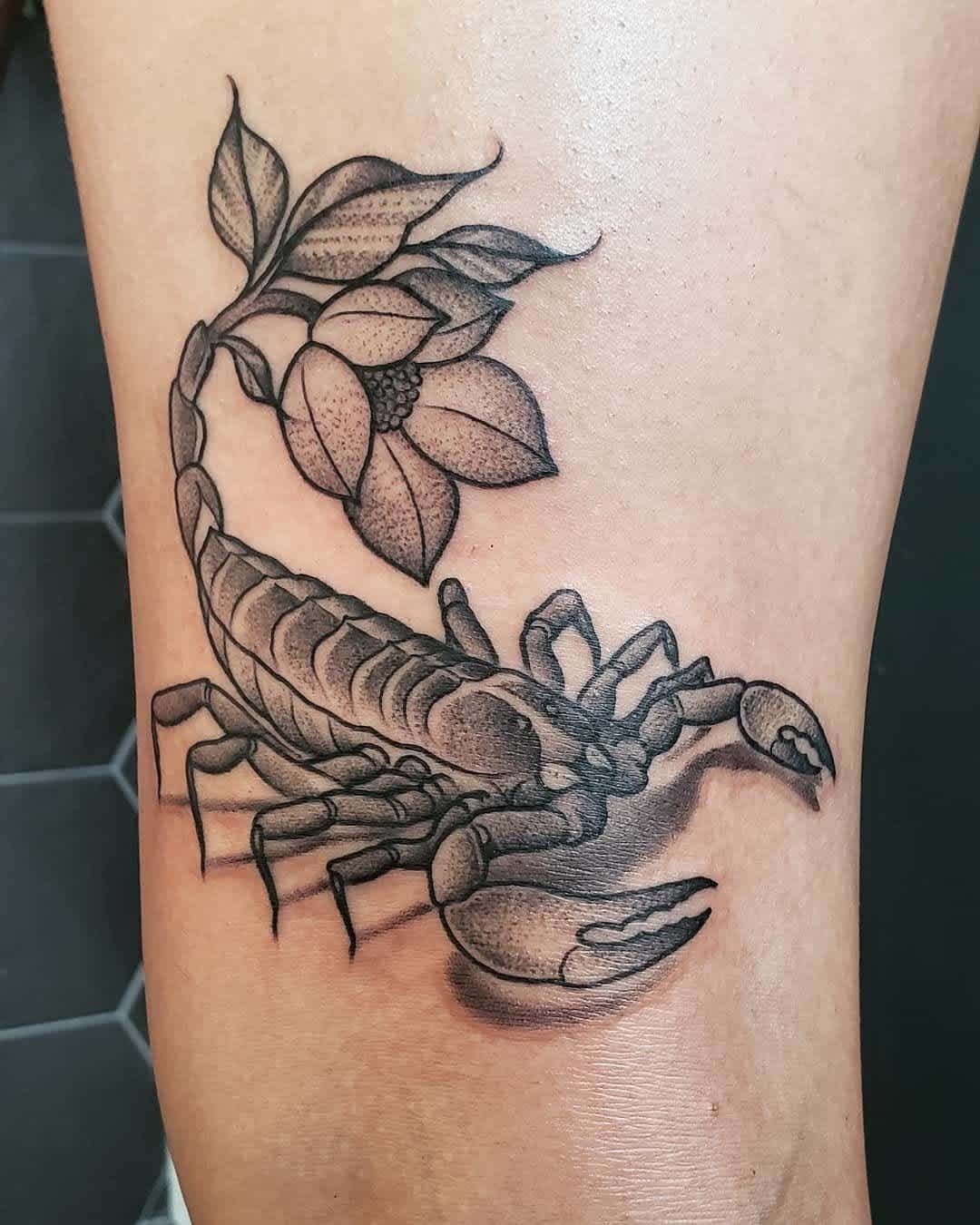Black-and-Gray Scorpion With Flower Tattoo Design