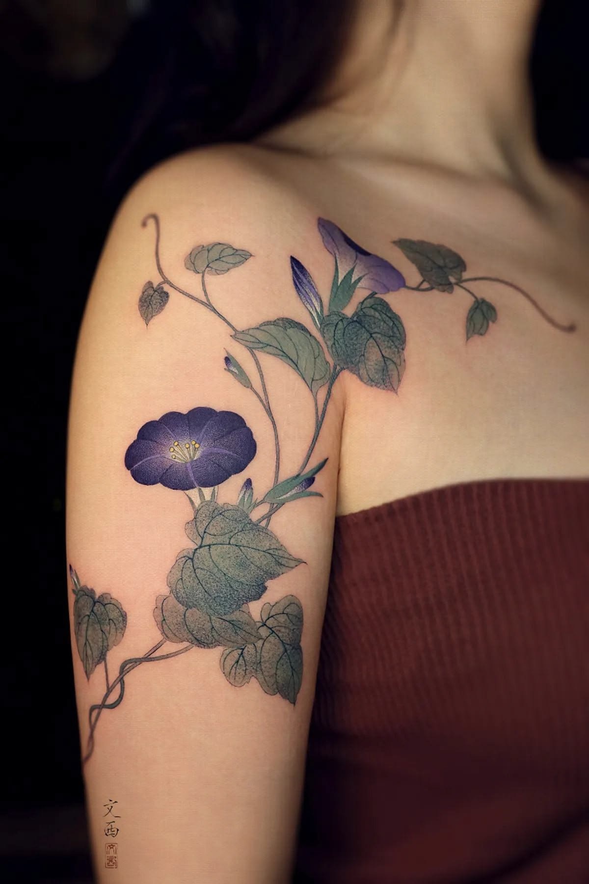 Blue Botanical Vine Shoulder Tattoo, a tattoo design rendered in clean detailed linework for the upper arm.