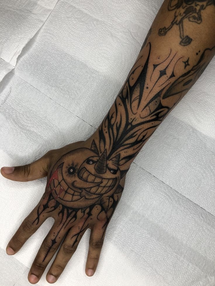 Hand and Forearm Sun Burst Tattoo Tattoo Design