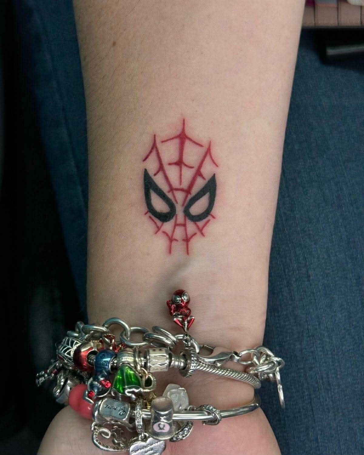 Minimal Black Spider On The Hip Tattoo Design