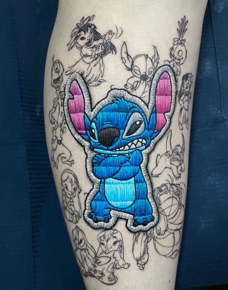 Embroidered Stitch Patch-Style Tattoo, a tattoo design rendered in bold.