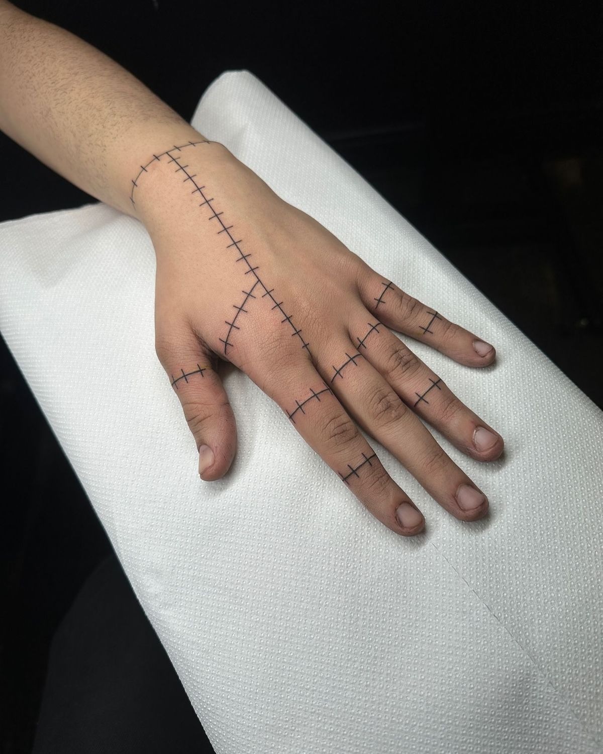 Extended Hand Stitch Pattern, a tattoo design rendered in geometric.