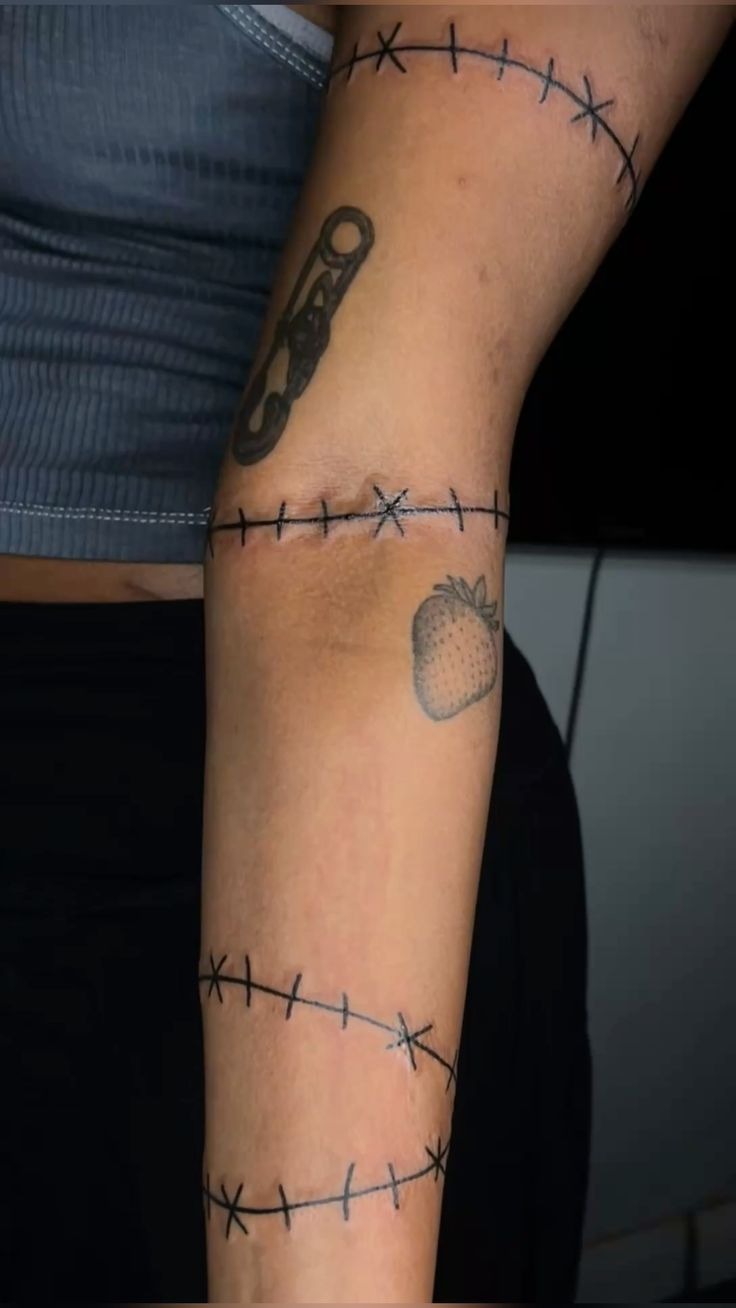 Minimalist Arm Stitch Lines, a tattoo design rendered in clean detailed linework.