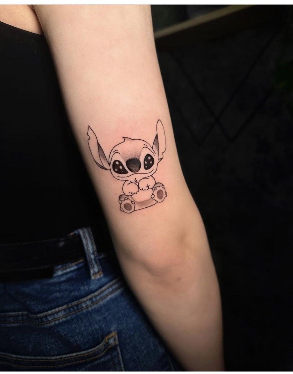 Minimalist Sitting Stitch Outline, a tattoo design rendered in clean detailed linework for the arm.