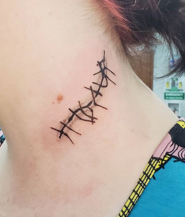 Neck-Stitched Scar Illusion, a tattoo design rendered in bold.