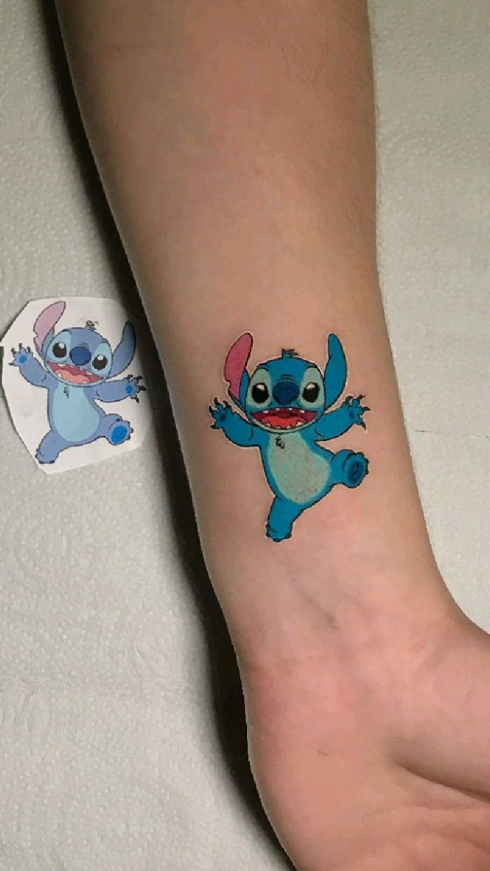 Playful Classic Stitch Character, a tattoo design rendered in clean detailed linework for the arm.