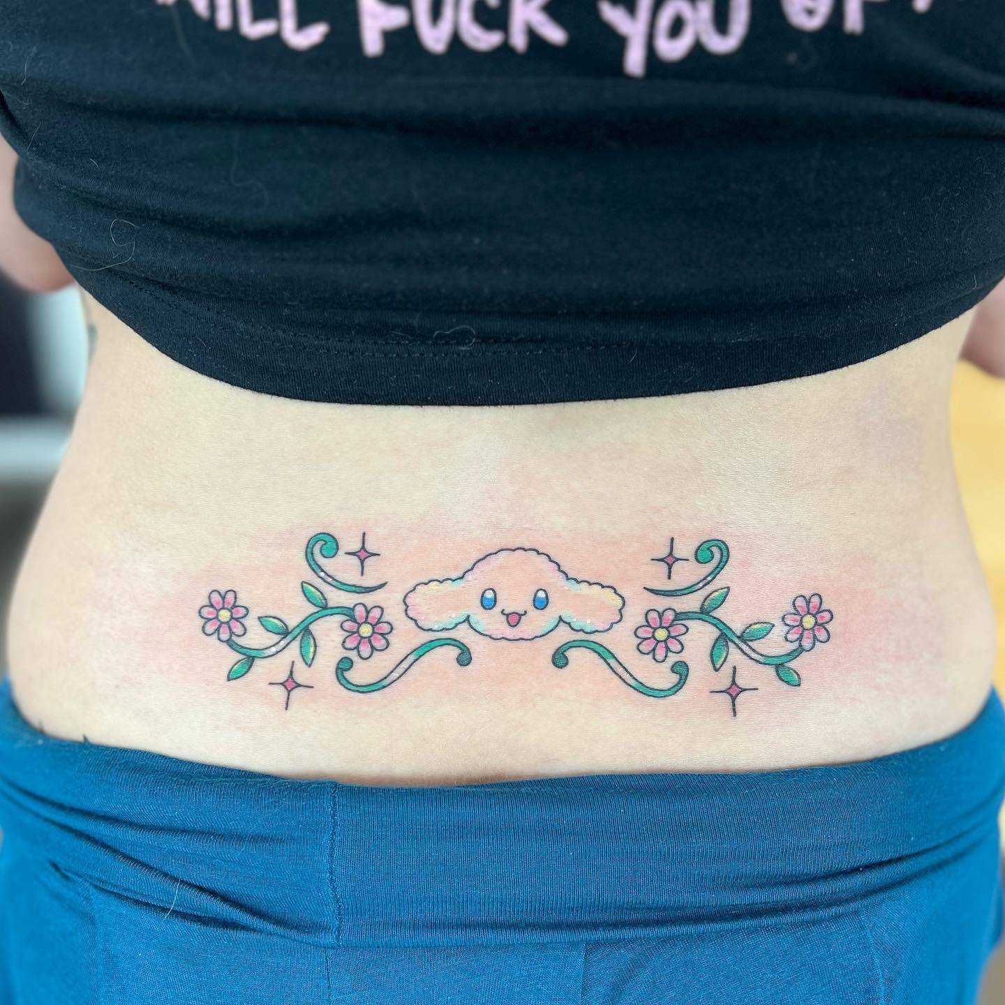 Bold Black Tribal Lower Back Tattoo Tattoo Design