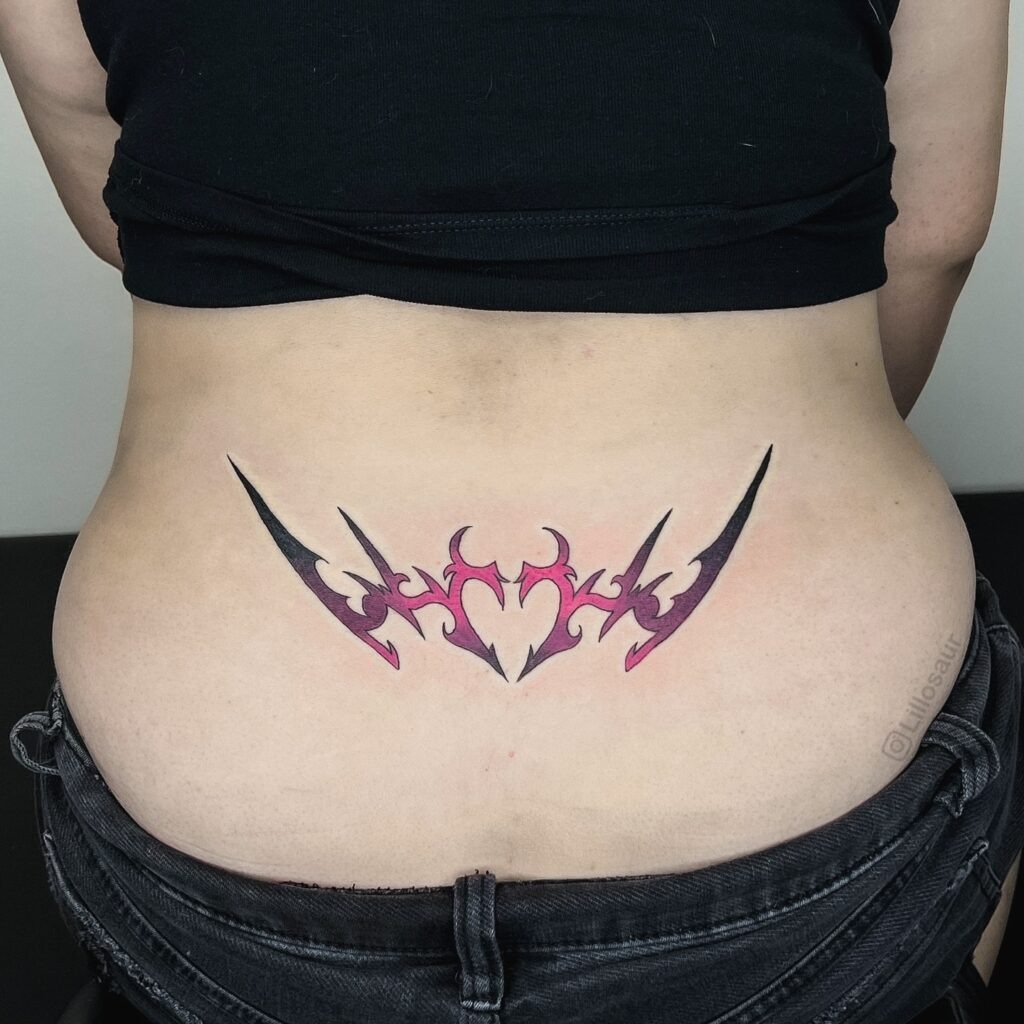 Sun and Ornamental Chains Lower Back Tattoo Tattoo Design