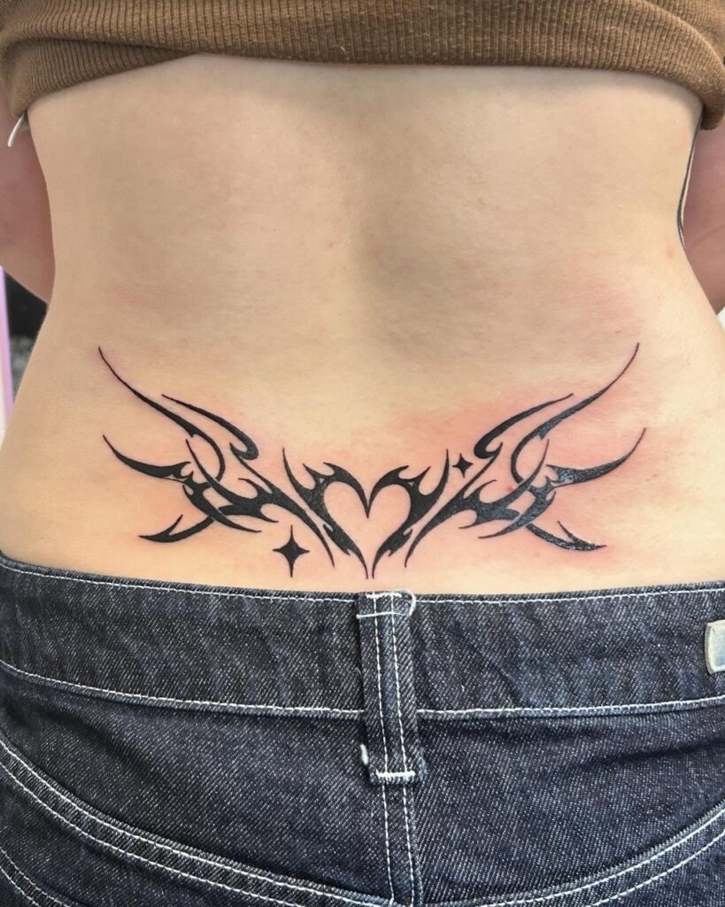 Tribal Butterfly in Red and Black Lower Back Tattoo Tattoo Design