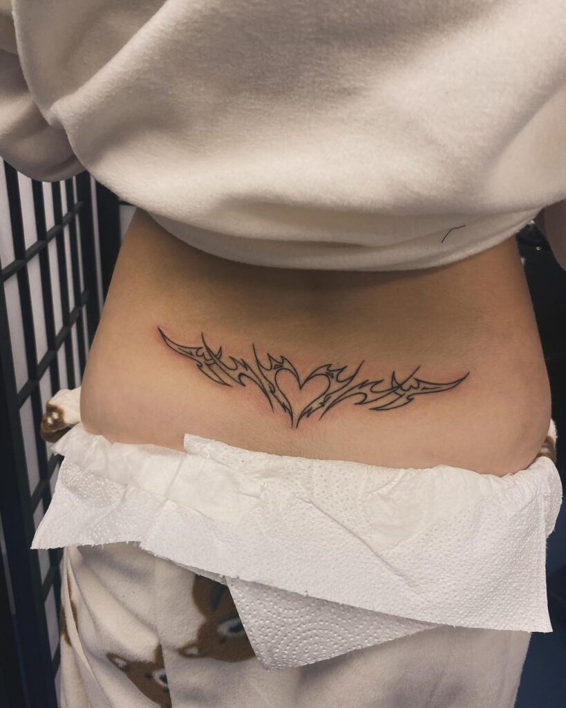 Tribal Heart with Stars Lower Back Tattoo Tattoo Design