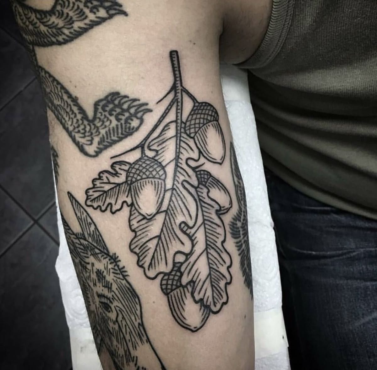 Acorns and Oak Leaves with a Flying Bird Tattoo Design