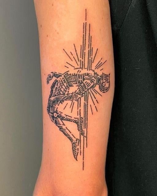 Radiant Catfish-Style Creature with Sunburst Lines Tattoo Design