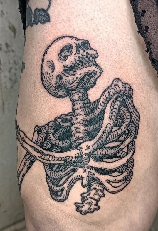 Skeletal Torso: Macabre, Cute, and Completely Chic Tattoo Design