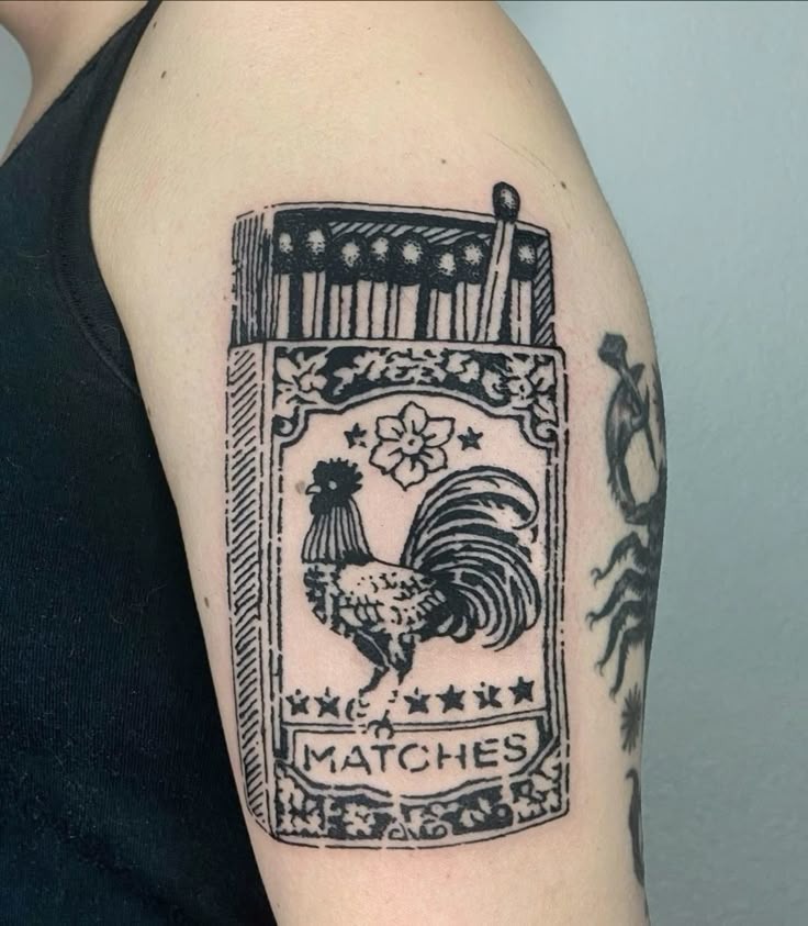 Vintage Matchbox Flash with a Rooster and Flowers Tattoo Design