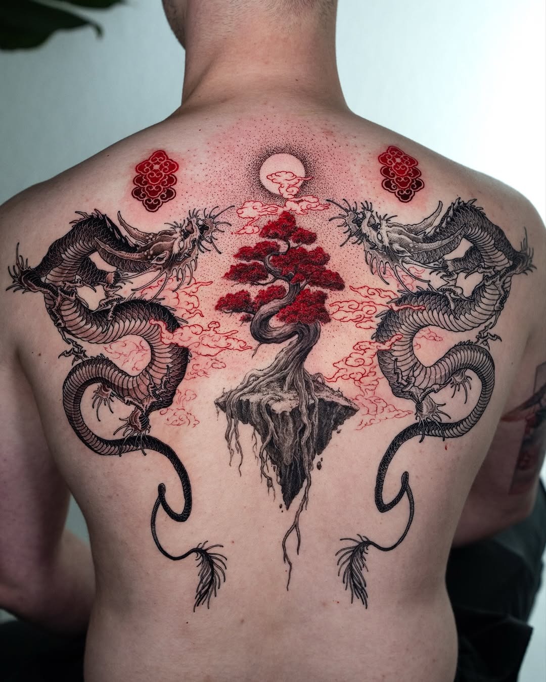Stunning bonsai tattoo with dragon motifs Tattoo Design