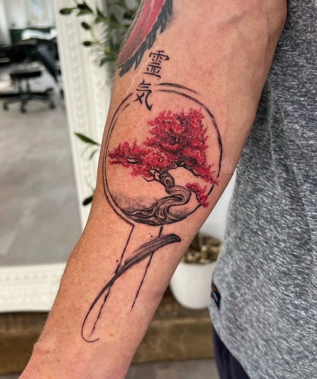 Stunning bonsai tattoo with vibrant red hues Tattoo Design