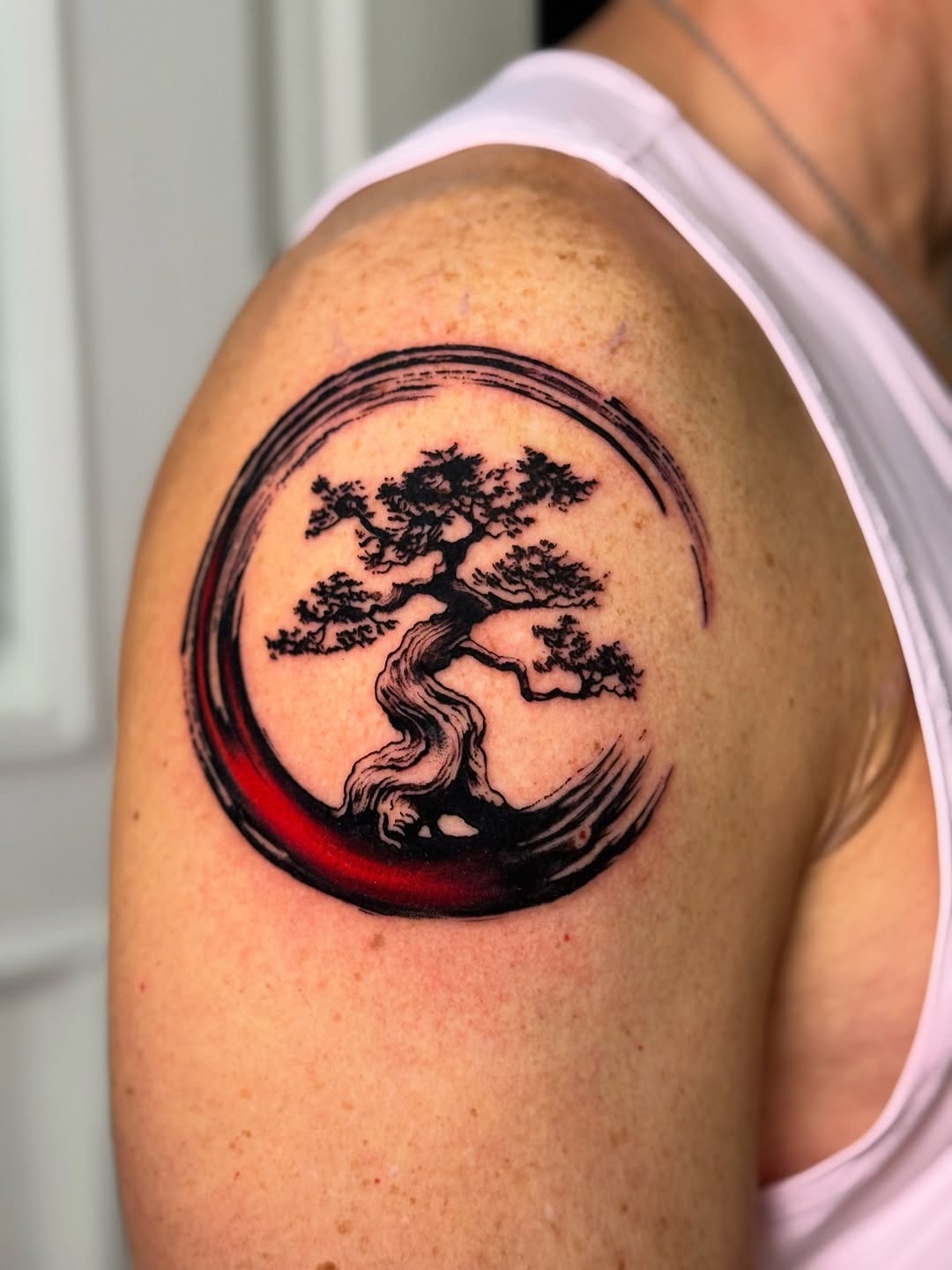 Stylized bonsai tree in circular design Tattoo Design