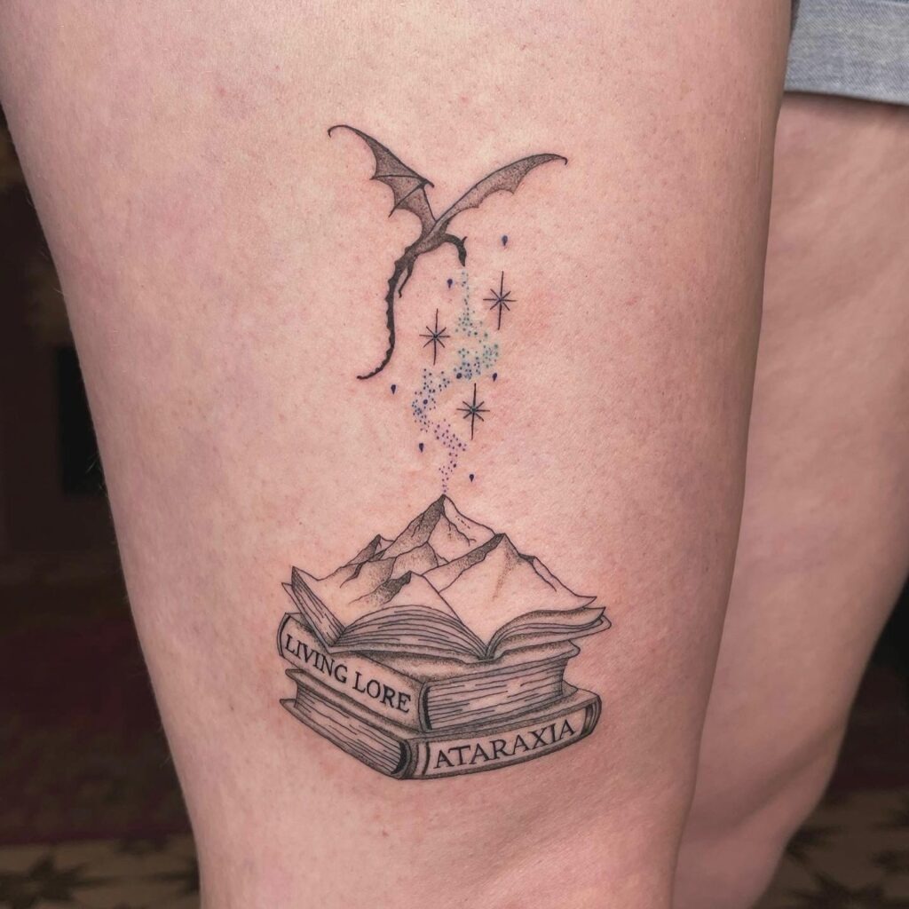 Books with Dragon, Mountains, and Stars Tattoo Tattoo Design