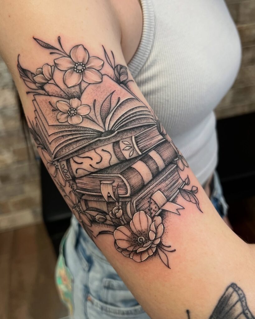 Delicate Blossoms and Books Tattoo Tattoo Design