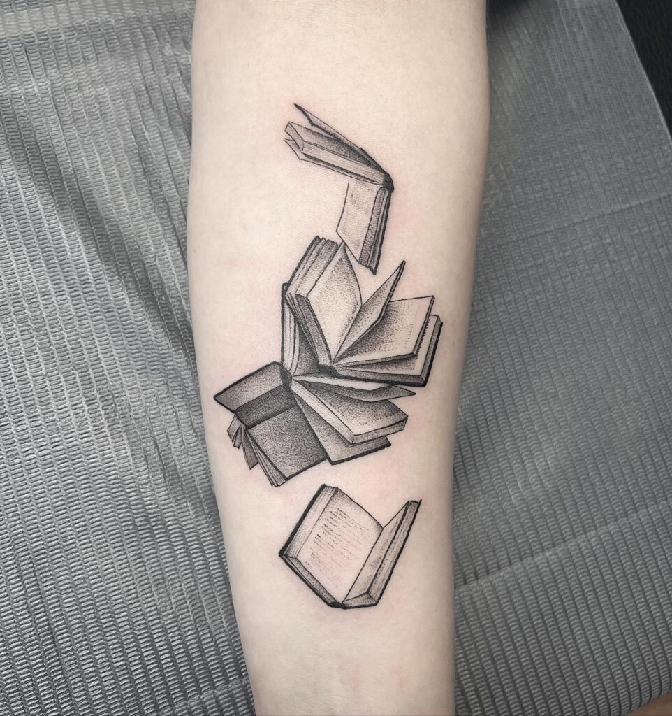 Falling Pages of Knowledge Tattoo Design