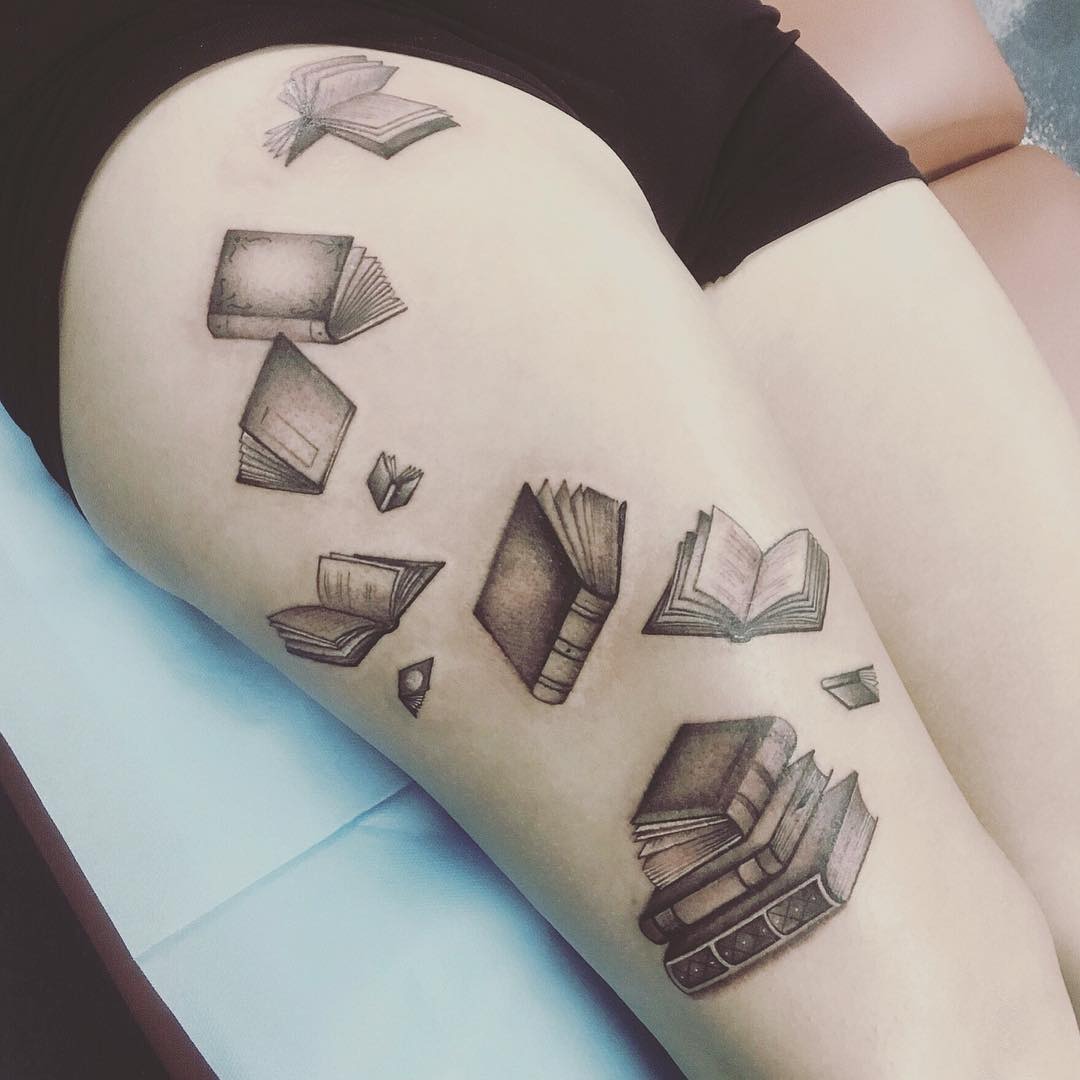 Floating Books in Motion Tattoo Tattoo Design