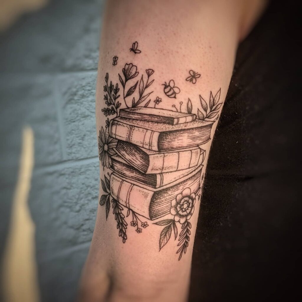 Nature-Laced Book Stack Tattoo Tattoo Design