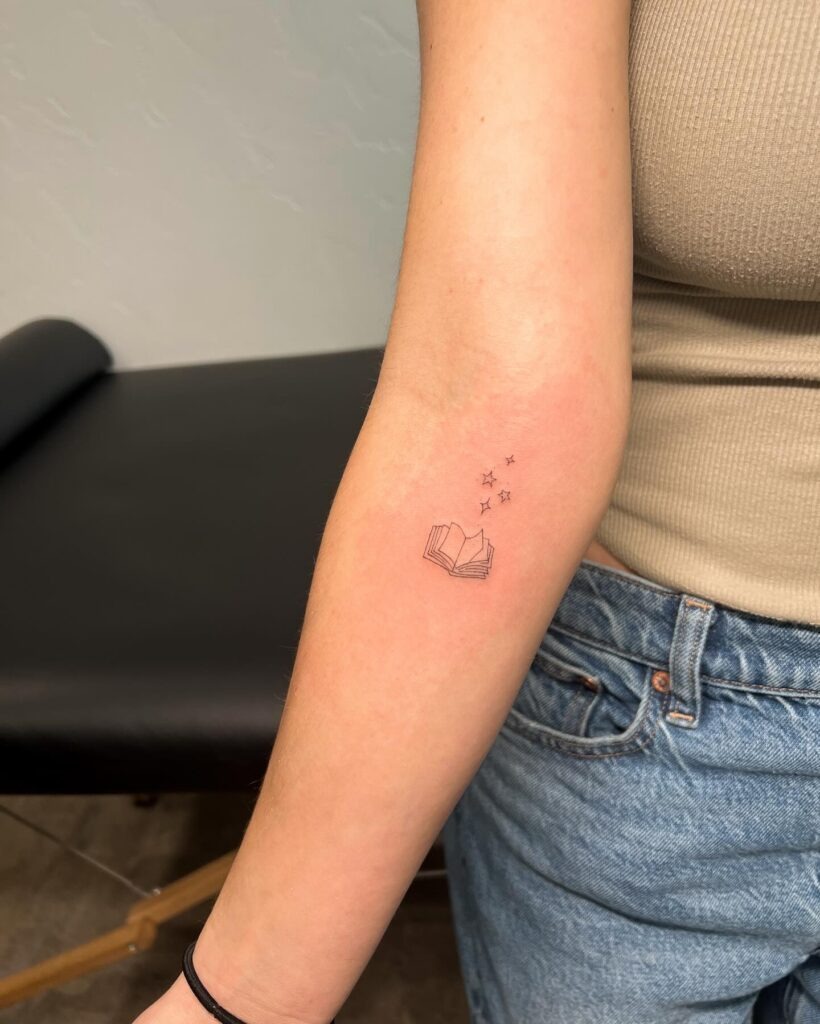 Tiny Open Book with Floating Stars Tattoo Tattoo Design
