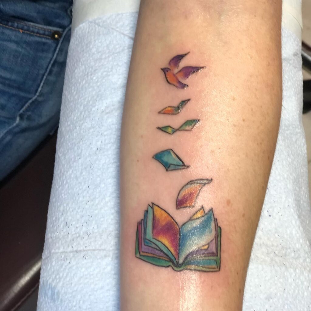 Watercolor Pages to Flight Tattoo Tattoo Design